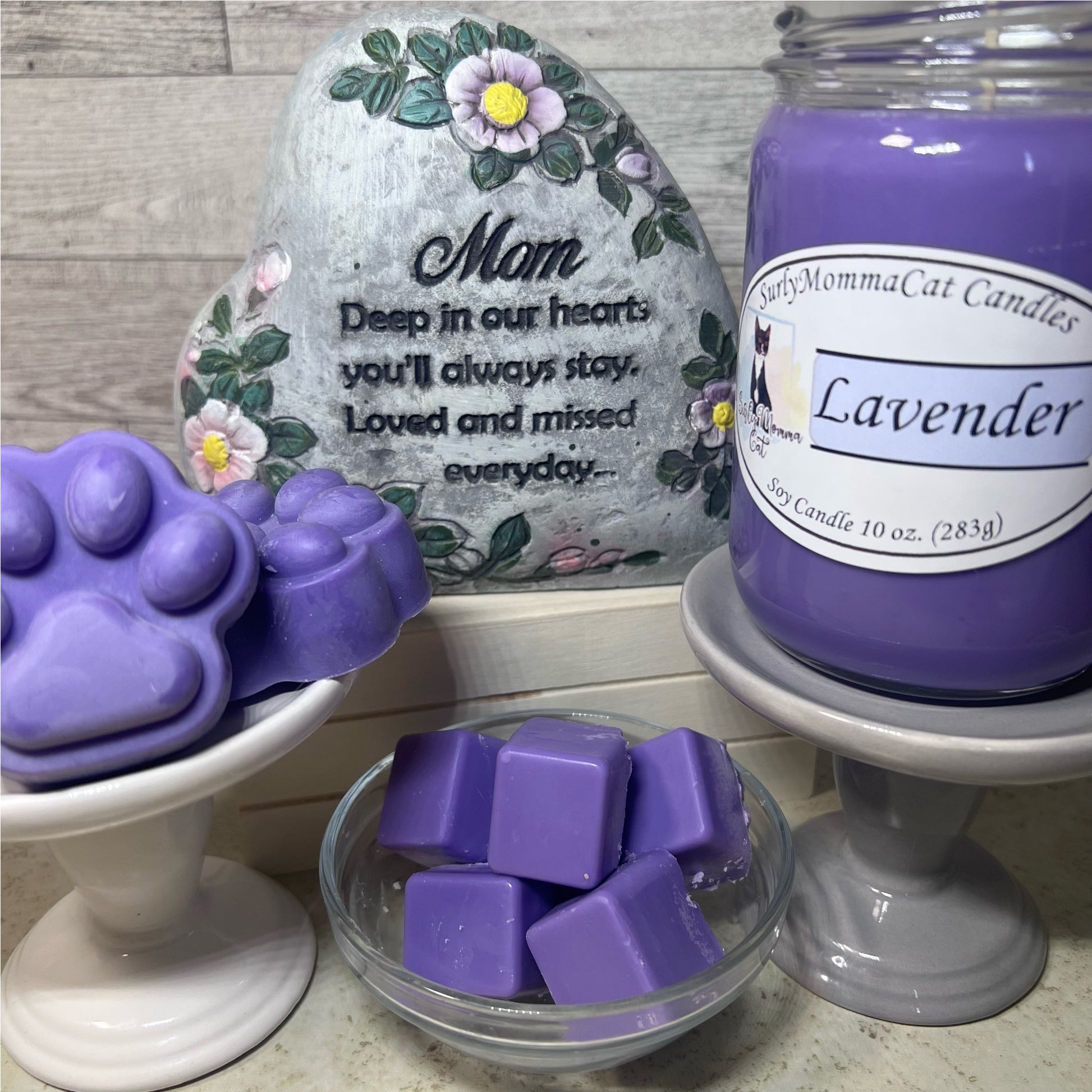 Purple Lavender Soy Glass Jar candle, Cubed wax melts, and Paw print wax melts, With a decorative stone that says"Mom Deep in our hearts you'll always stay. Loved and missed everyday..."