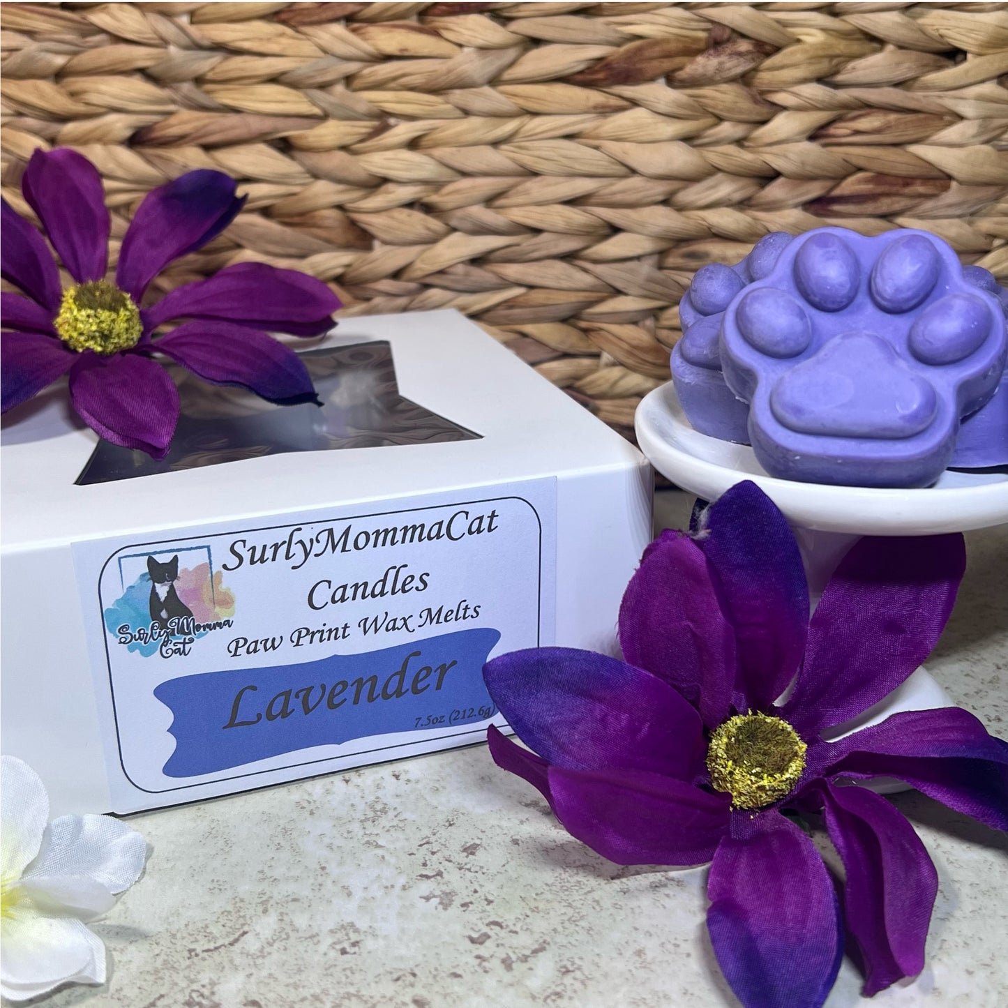 Purple Lavender Soy Paw print wax melts, with two large purple flowers for decoration.